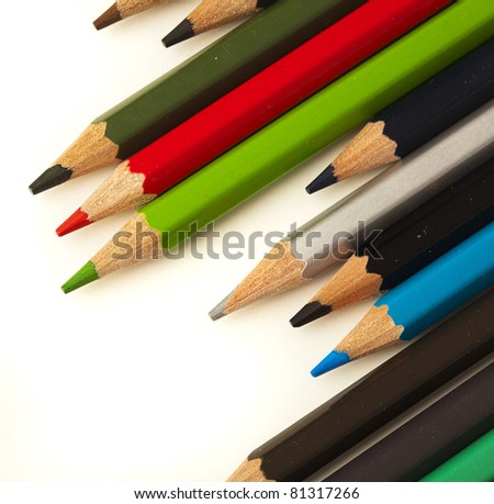 closeup of different crayons on a white background