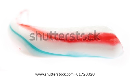 pink and blue toothpaste isolated on a white background