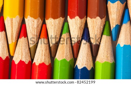 extreme closeup of crayon colors stack texture