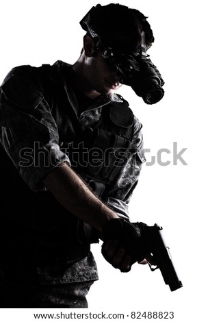 soldier wearing urban camouflage uniform with night vision goggles and a gun on white background