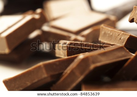 extreme closeup of a chocolate pieces stack