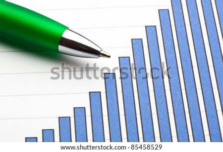 diagram graph and office pen, extreme closeup photo