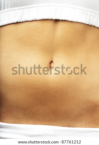 hispanic woman belly button closeup