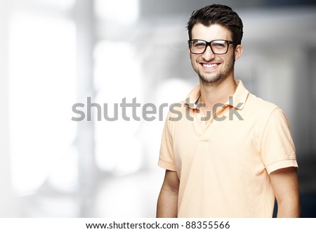 portrait of a handsome happy man indoor