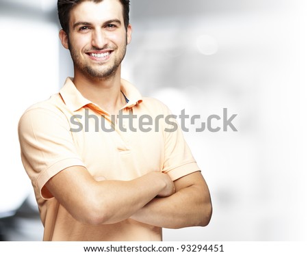 portrait of a happy young man smiling indoor