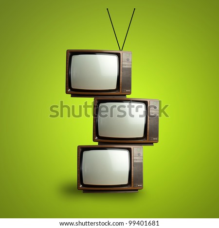 vintage television pile over green background