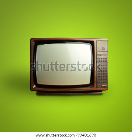 vintage television over green background
