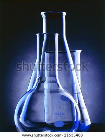 An array of lab glassware including Erlenmeyer flask, boiling flask and beaker