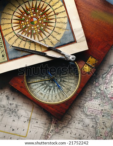 An antique compass and map from the 19th century. This compass rose drawing is from the 16th century