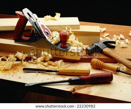 Carpenters tools with wood and wood shavings