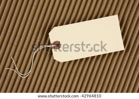 Blank hang tag with space for copy shot on corrugated cardboard