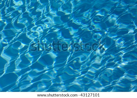 Swimming pool filled with inviting, refreshing, blue water