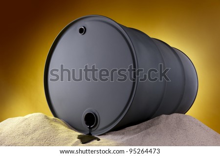 Oil trickles out of barrel onto the desert sand