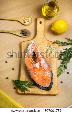 Frozen salmon steak with spices