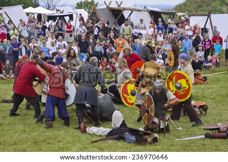 FOTEVIKEN, SWEDEN - JULY 03, 2011: Vikings in a battle on a Viking camp in Foteviken Sweden, July 03 2011. Here was vikings from the whole north Europe, even from east.