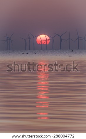 During the sunset, the sun, itsself a natural power, putting focus on other natural power, the wind. Two global and natural power system in one image. From Oresund, between Denmark and Sweden.