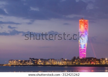 MALMO, SWEDEN - MAY 18, 2013: The skyscraper, Turning Torso, in lighting show during the final in Eurovision Song Contest, ESC.