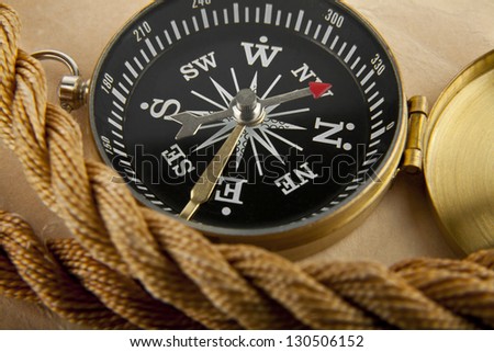 compass on the background of an old paper