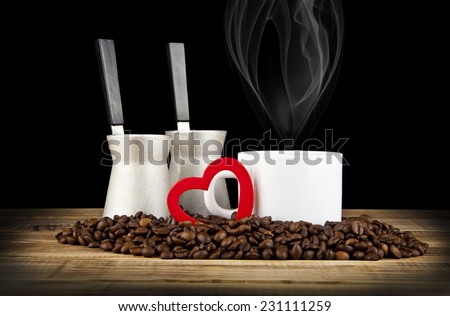 cup of coffee with grains on a black background