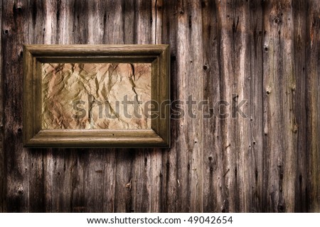 wooden print-holder on wood background