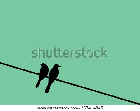 2 silhouette birds on wire on green background