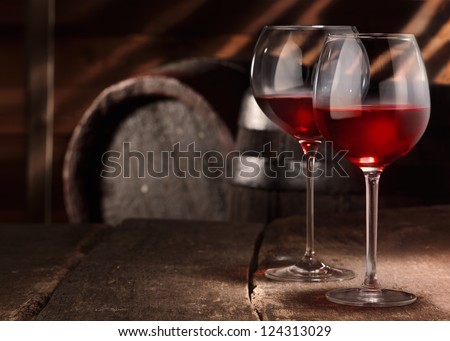 Two Glasses Of Red Wine On A Table In A Vintage Beer Cellar