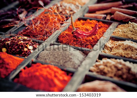 Close-Up Of Different Types Of Assorted Spices In A Wooden Box.