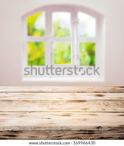 Empty Scrubbed Clean Rustic Wooden Kitchen Table Under A Pretty White Domed Window With Cottage Panes In A Country Kitchen Ready For Your Cooking Ingredients Or Product Placement