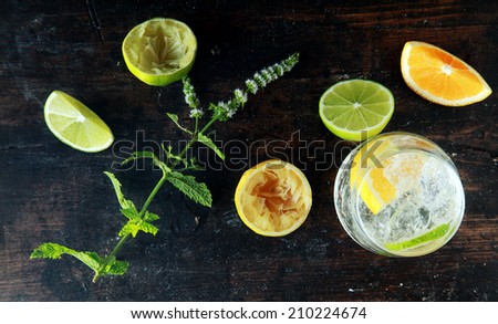 Preparing Lemon Water on Wooden Table for Meal. Source for Anti Oxidants