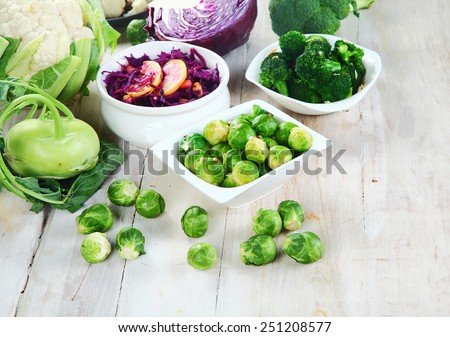 Close up Newly Harvested Healthy Farm Vegetables for Recipe Ingredients on Top of Wooden Table