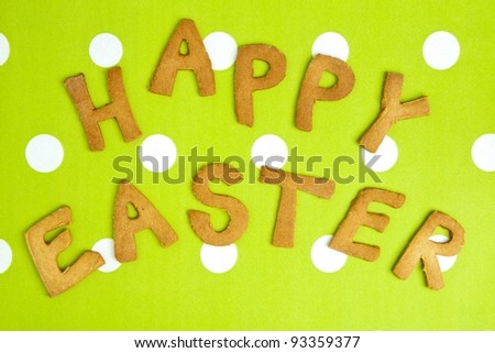 Happy Easter Card On green fabric. Words HAPPY EASTER on a tureen fabric background, festive card for Easter holiday.
