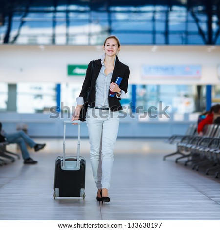 Pretty Young Female Passenger At The Airport (Shallow Dof; Color Toned Image)