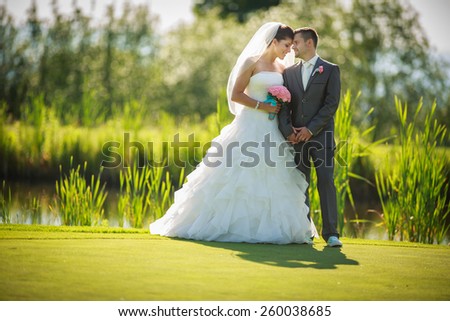 Portrait of a young wedding couple on their wedding day