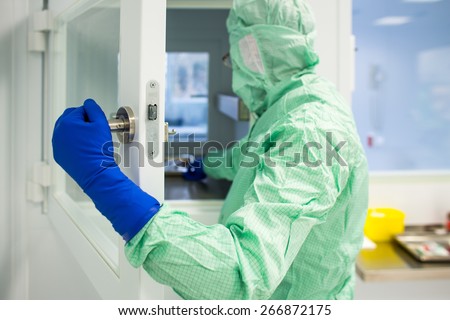 Work in super clean lab environment - (shallow DOF; color toned image)