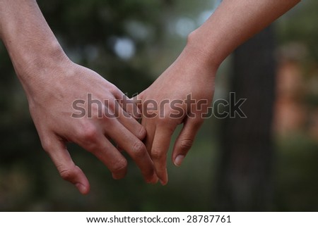 Lovers Couple Holding Hands In