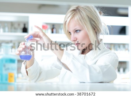 Closeup of a female researcher carrying out some experiments in a lab