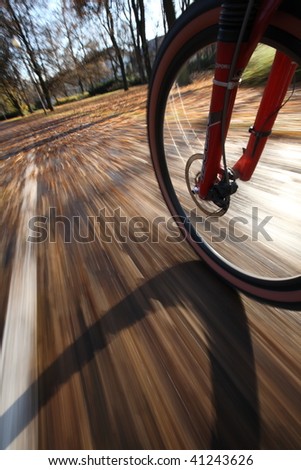 Commuting to work on a lovely autumn day (motion blur is used to convey movement)