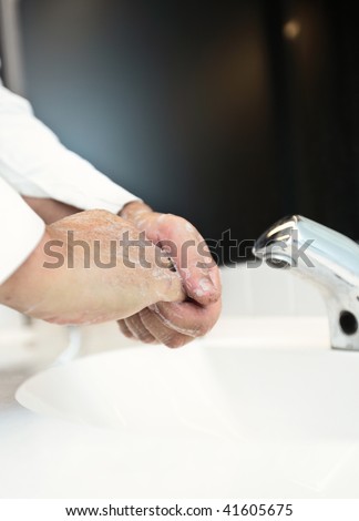 Flu/disease prevention - Washing hands thoroughly with running water and soap