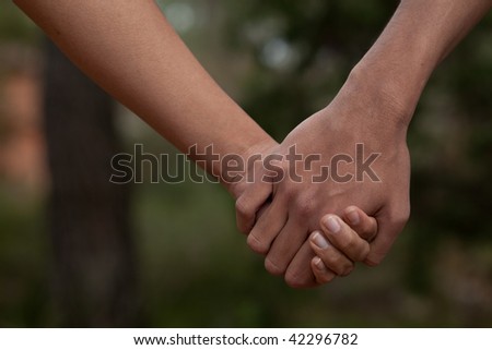 Two lovers holding hands