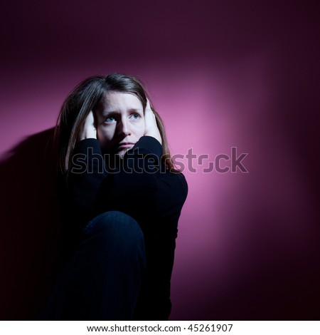 Young woman suffering from severe depression/anxiety
