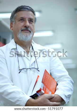 Renowned scientist/doctor in a research center/hospital looking confident