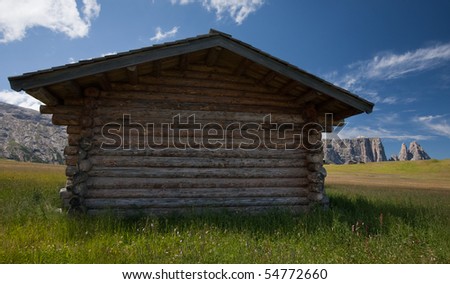mountain cabin with plenty room for your text/adverstising/posters to put on it