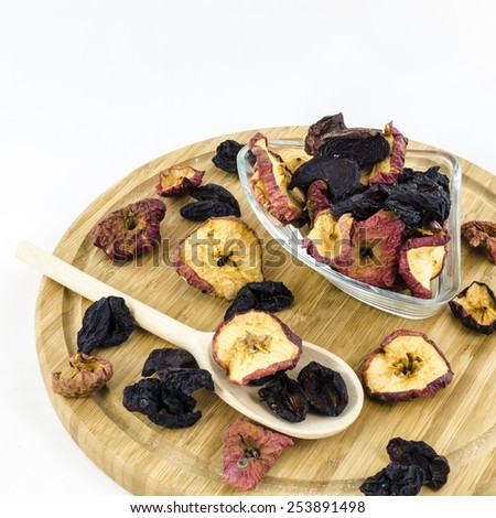 Dry fruits on wooden board.