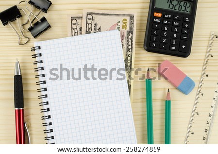 Office, business tools with blank notebook on wooden table
