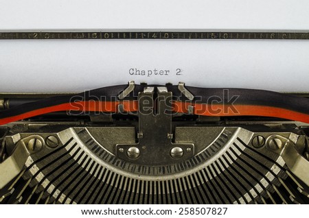Chapter 2 word printed on an old typewriter