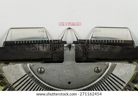 Customer word printed on an old typewriter