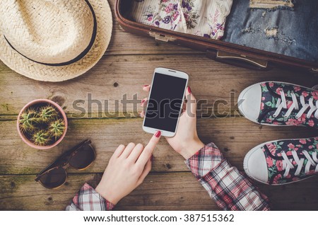 Travel preparations on wooden table