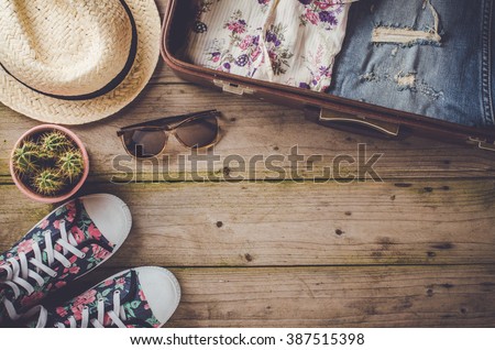 Travel preparations on wooden table