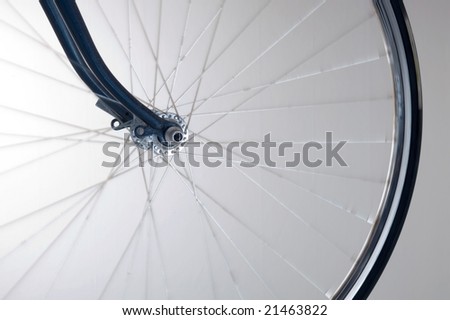 front wheel of road bike with blue forks