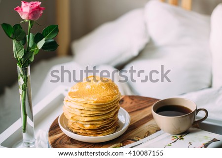 Breakfast in bed. Woman morning concept